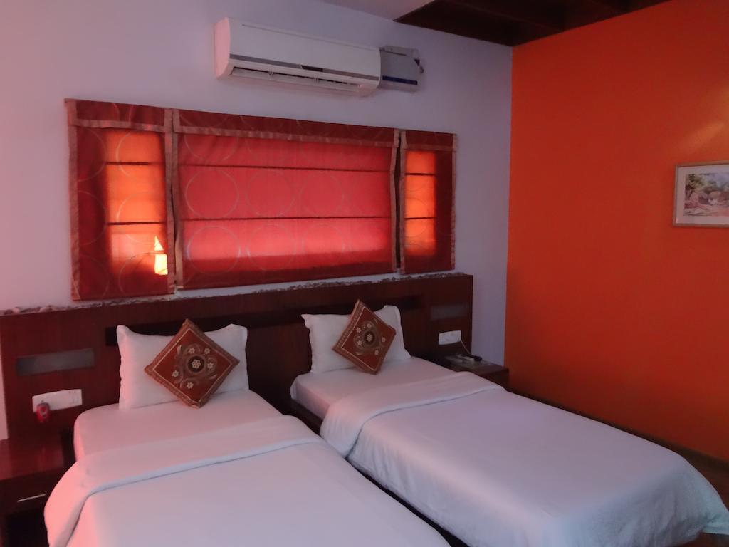 Compact Copper Quilt Hotel Bangalore Quarto foto